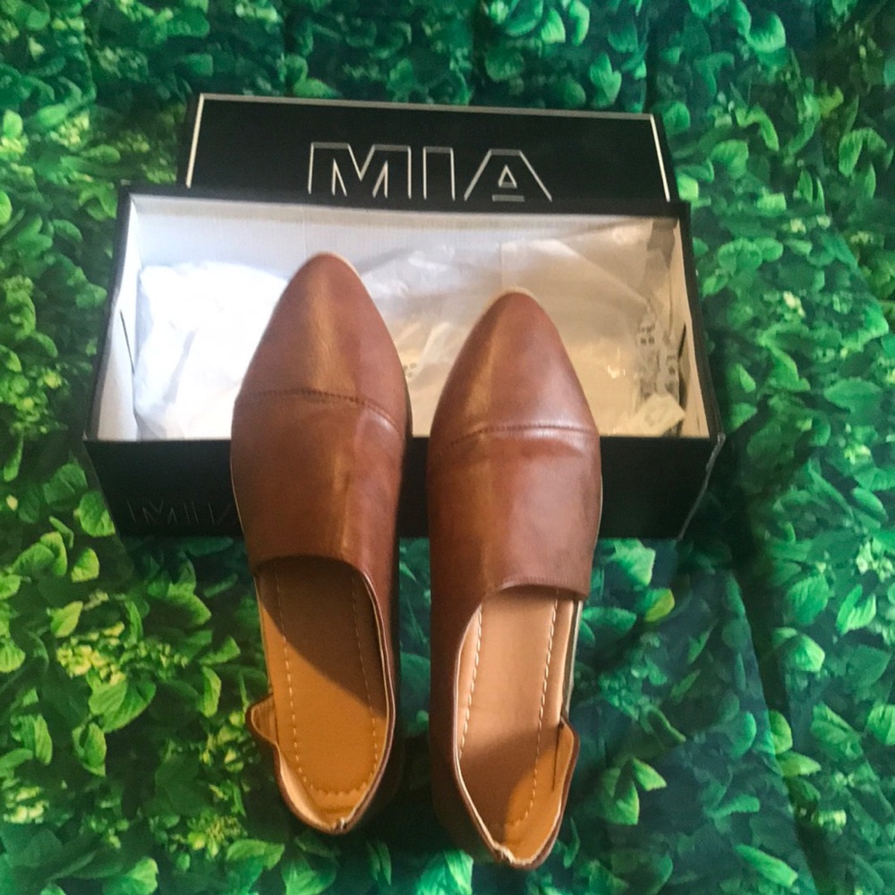 Brand new leather shoes never worn.